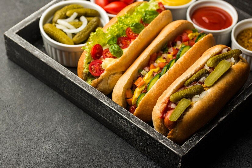 Hot dogs are common foods at sports games and birthday parties