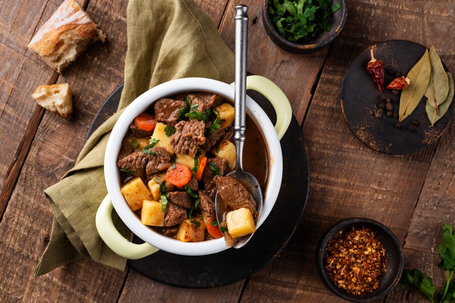 First, the beef is cut into cubes, seasoned, and browned in a hot pan to develop a deep crust